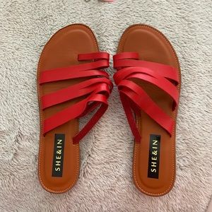 Red strappy sandals